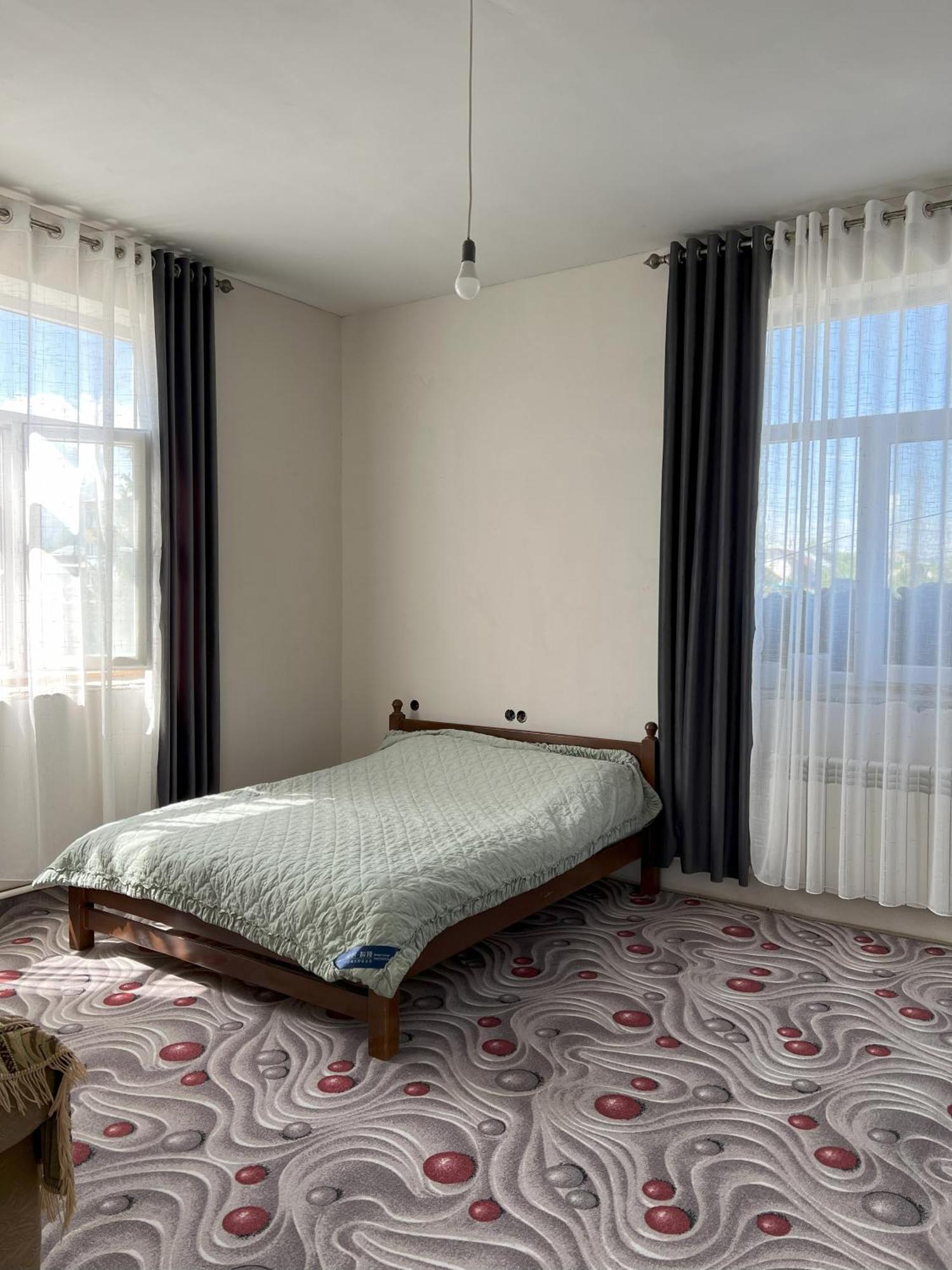 Emir Guest House In Karakol Buitenkant foto